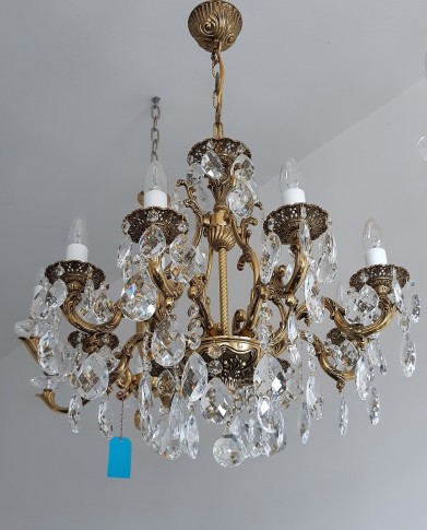 8-arm cast metal chandelier with crystal trimmings