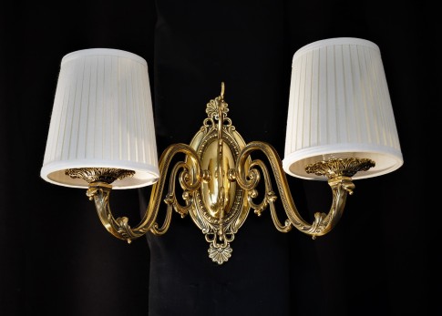 Brass wall light with white lampshades