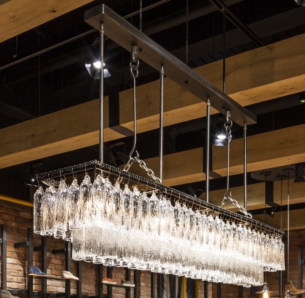 The custom-made iron chandeliers for a biker restaurant