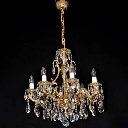 8-arm massice cast brass chandelier with shiny gold surface