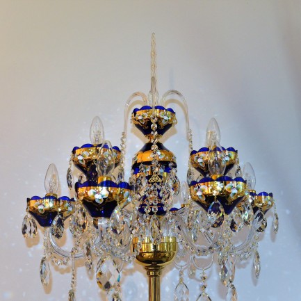 Upper part of blue floor lamp with the crystal spike