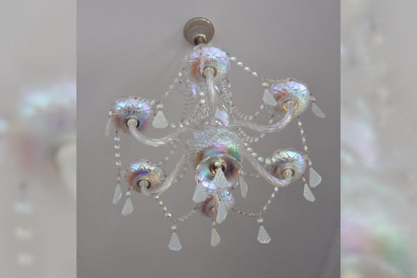 Glass chandelier with metallized surface